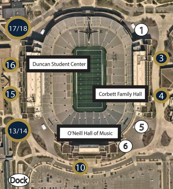 An aerial view of a large football stadium oriented with north at the top. Three adjoining buildings—Duncan Student Center (west), Corbett Family Hall (east), and O’Neill Hall of Music (south)—are indicated by rectangular labels. A dock area is labeled at the southwest corner.